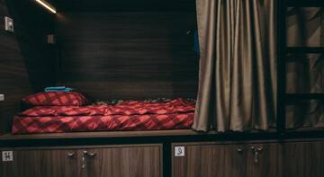 Фото номера Кровать в общем четырехместном номере для женщин Гостиница Капсульный хостел Якорный Парк г. Петрозаводск 7